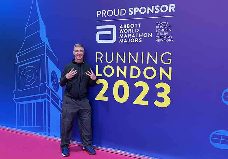 Mike Sohaskey at Abbott World Marathon Majors booth at the 2023 London Marathon expo 